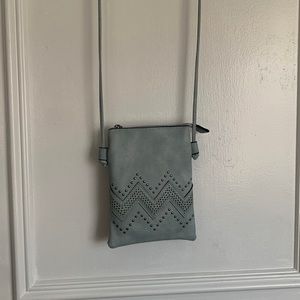 Light blue/steel blue cross body bag with cell phone holder